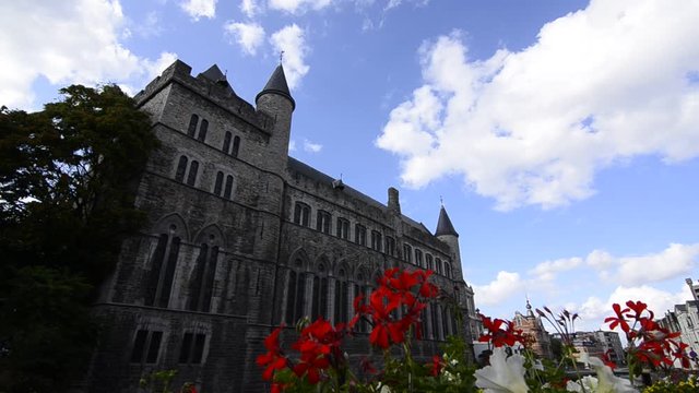 Ghent, Flanders, Belgium. August 2019. The graceful Castle Of Gerald the Devil. The flowers frame the castle.