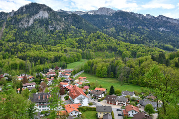 Fototapeta na wymiar Aschau, Germany - May, 2019. village of Aschau im Chiemgau, Bavaria. Panoramic View over Aschau im Chiemgau. Picturesque village in the alps mountains 