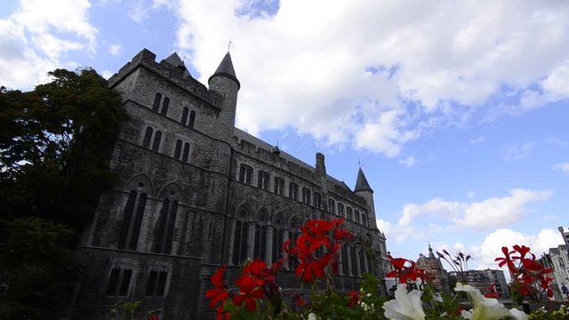 Ghent, Flanders, Belgium. August 2019. The graceful Castle Of Gerald the Devil. The flowers frame the castle.
