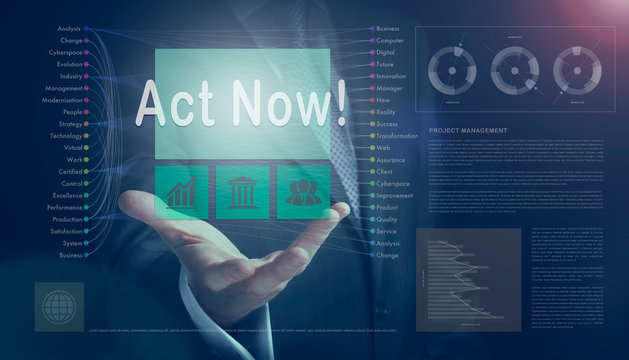 Businessman outreached hand holding a Act Now business concept on a computerised screen display.