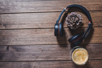 cup of coffee on wooden table with space for copy