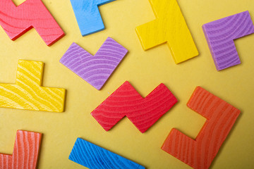 Pieces of wooden colorful  puzzle as business strategy concept