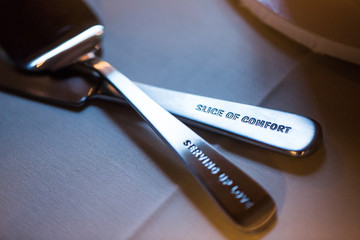 serving spoons engraved with words