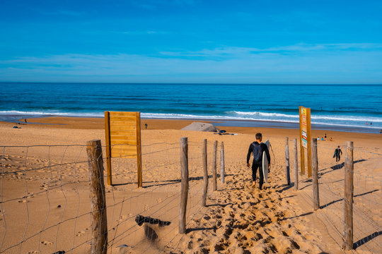 Labenne Oc&eacute;an, les Landes / France &raquo;; October 26, 2019: A surfer going down to Labenne Oc&eacute;an beach