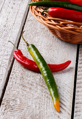 chili peppers on an old wooden table