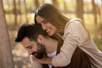 young love couple hugging happily - stock image
