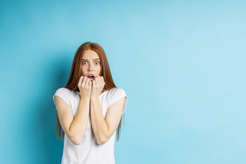 Portrait of young redhead woman