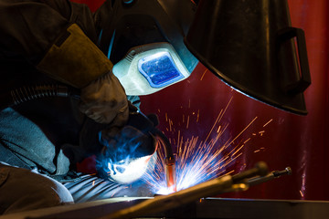 Industrial steel welder in factory welder, craftsman