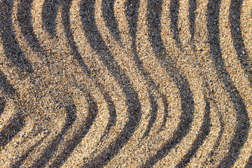 Wave line pattern. Natural sand texture. A game of shadows.