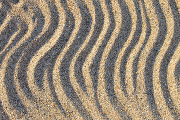 Wave line pattern. Natural sand texture. A game of shadows.