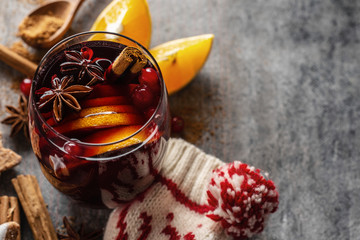 Mulled wine in glass with cinnammon