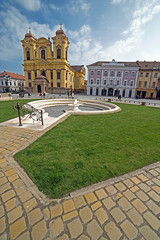  View of one part at Union Square in Timisoara, Romania, with old buildings and mineral fountain 2