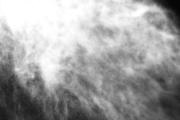 A stream of water and a cloud of drops