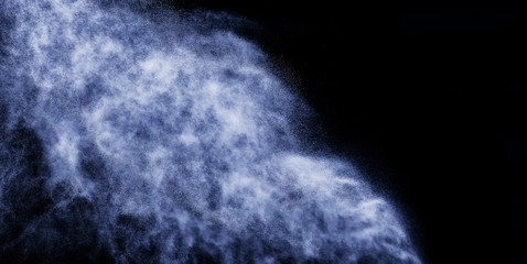 A stream of water and a cloud of drops