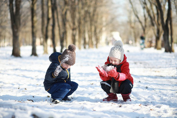 Children in winter park play