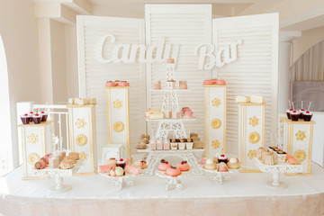 Candy Bar. Delicious sweet buffet with cupcakes. Sweet holiday buffet with cupcakes and other desserts.