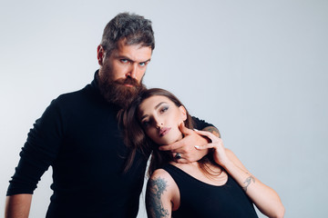 hairdresser and barbershop. tattoo salon. male beard care. hipster man with sexy girl. relationship. fashion couple. couple in love. brutal bearded man and woman with tattoo. hipster couple