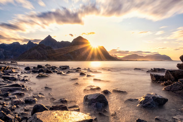 Beautiful view of mountains and beach in Lofoten Islands at sunset