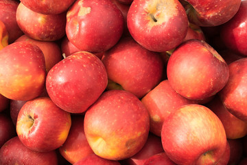 Red ripe apples in a shop window of a market, store, supermarket