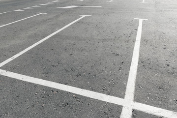 Fototapeta premium Road marking on asphalt with parking spots