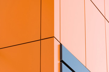 Geometric color elements of the building facade with planes, lines, corners with highlights and...