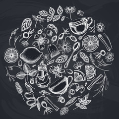 Round design with chalk cinnamon, lemons, oranges, tea bag, sugar cubes, heather, chamomile, dog rose, peppermint, almond, strawberry, teaspoon, teapots, cups, sugar bowl