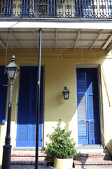 purple shutters on entrance to house in French Quarter