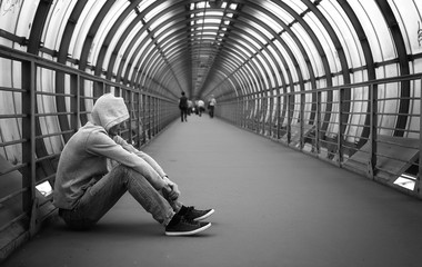 man in a hoodie black and white