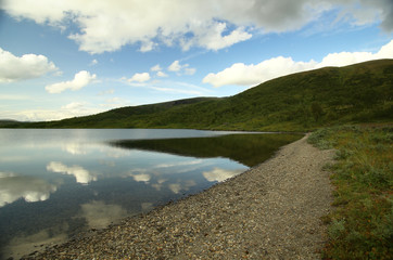 Fototapeta premium Shores of Lake Silesjaure in Blasjofjalls nature reserve near the Wilderness Road in Sweden