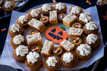 Halloween Pumpkin Cookies with Rice Crispy Treats and Cupcakes with Icing