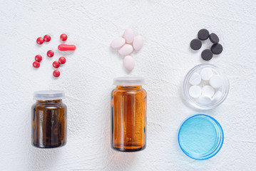 Various medicine drug on a white flat lay background. Medical background.