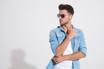 Eager casual man looking to the side