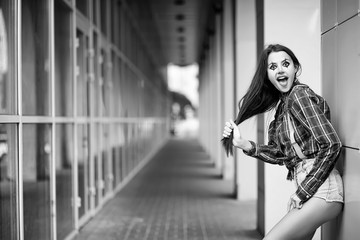 Girl in a clown makeup black and white