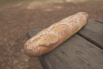 RUSTIC BREAD BAR MADE WITH MOTHER MASS ON OLD WOODEN TABLE
