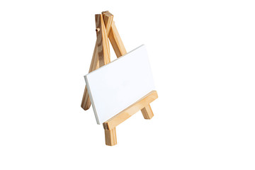 Mock Up Empty blank canvas on wooden easel isolated on white background.