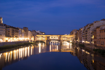 Beautiful view of the Ponte Vecchio bridge across the Arno River in Florence, Italy