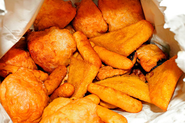 Neapolitan panzerotti, zeppole, aubergine, and polenta just fried