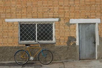 bicycle on brick wall