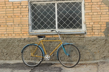 Obraz premium old bicycle on the wall