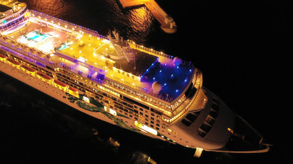 Aerial night shot of Cruise liner ready to depard from Mediterranean port