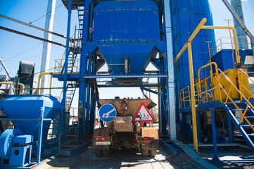 Equipment for production of asphalt, cement and concrete