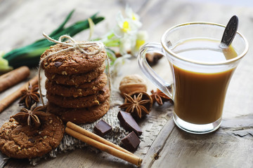 Coffee table. Cup with a hot coffee drink. A set of fragrant cookies for breakfast for the holiday.