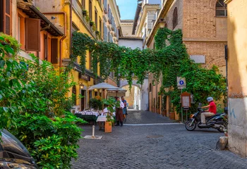 Foto auf Acrylglas Cozy old street in Trastevere in Rome, Italy. Trastevere is rione of Rome, on west bank of Tiber in Rome. Architecture and landmark of Rome © Ekaterina Belova