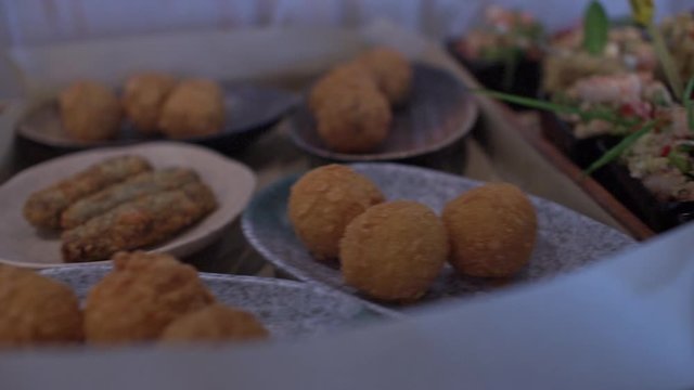 Close up of italian stuzzichini tapas PAN shot