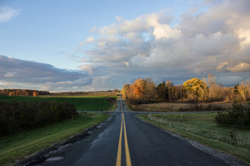 country road in fall sunset