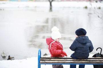 Children in winter park play