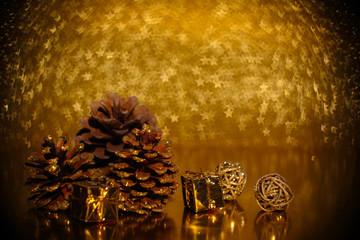 Pine cones on golden background