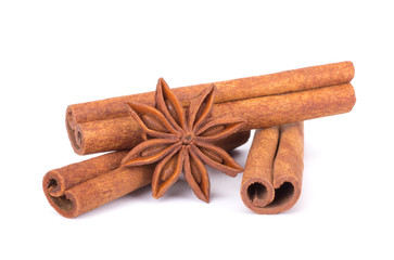 Spicy Cinnamon Sticks and Anise isolated on White background closeup macro shot