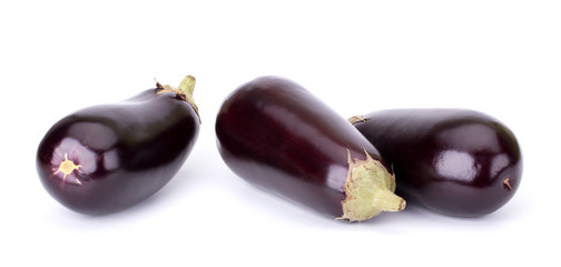 Black ripe Eggplants isolated on white background, closeup