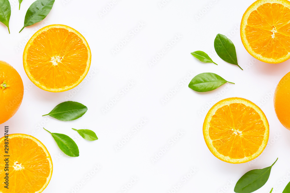 Wall mural frame made ofresh orange citrus fruit with leaves isolated on white background.